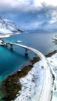 Top drone view of bridge in cold winter day