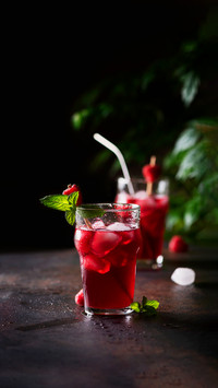 Fresh summer cold cocktail with raspberry