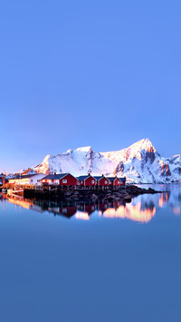 Winter landscape with houses in village