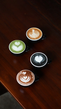 Coffee Quartet, A Symphony of Flavors on a Dark Wooden Table