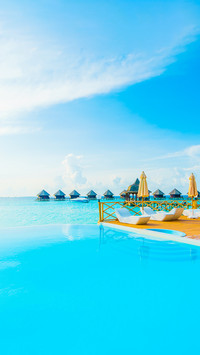 Beautiful luxury outdoor swimming pool with umbrella
