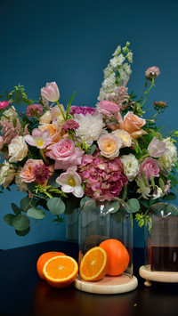 Flowers and fresh oranges