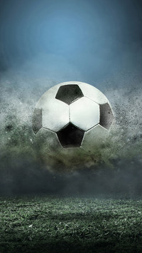 Soccer ball splash drops on the stadium field