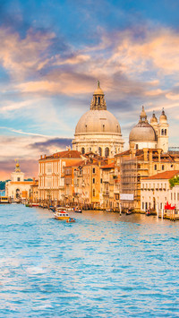 Beautiful view of Gondola on famous Canal Grande at sunset