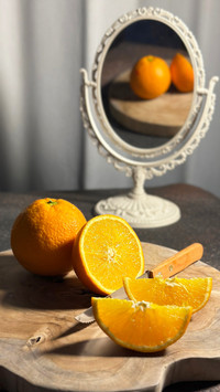 Still life Photography of Orange Slice on the tray