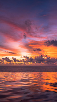 Enjoy the colorful sunset by the seaside