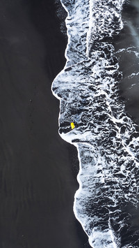 Experience the fantasy of the black sand beach 2