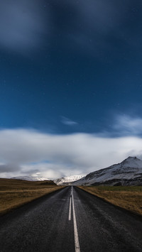 Starry night and empty driving road in Iceland