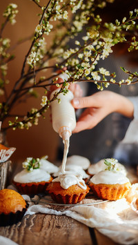 A Woman is Making Cream Cake