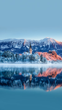 Beautiful lake Bled in Slovenia on a snowy winter morning