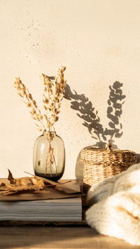 Cozy home still life of dry flowers in vase on wooden