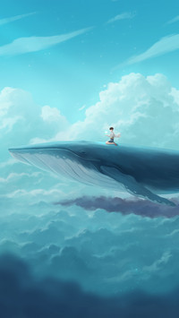 A boy swimming with whales