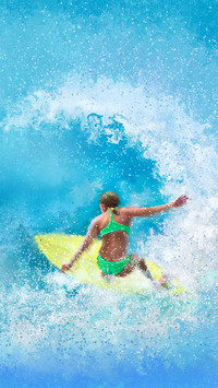 Female surfer in the waves