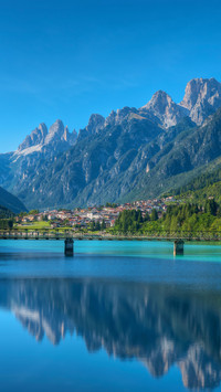 View at the auronzo lake and auronzo with tre cime di