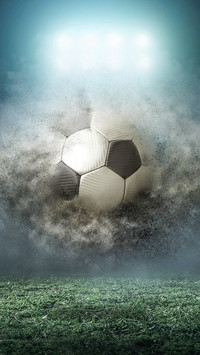 Soccer player with ball in action outdoors