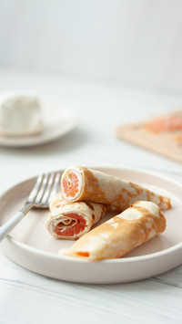 Traditional Russian pancakes with salmon