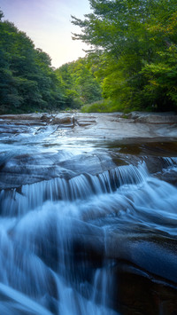 The secluded stream of linxi exudes a clear and gentle