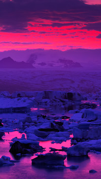 Iceland jokulsarlon lagoon icebergs at dusk