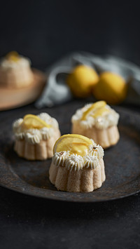Mini lemon bundt cakes topped with lemon