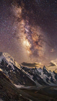 The starry night on the snowcapped peak