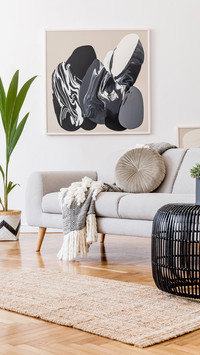 Living Room with Gray Sofa, Rattan Table and Decoration