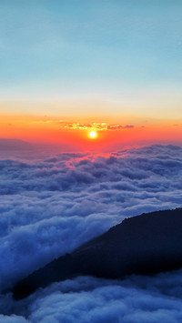 The sunrise over the sea of clouds over ailao mountain