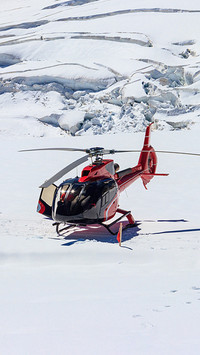 A hovering helicopter completes one orbit around the