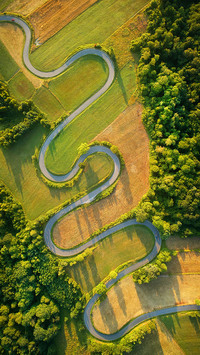 Drone aerial view - windy road in summer