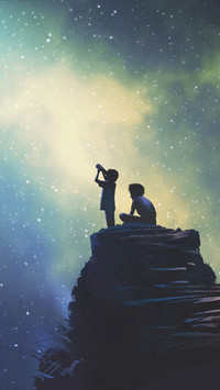 llittle boy looking through a telescope