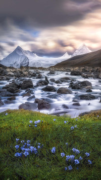 Snow capped mountains are poetry lines frozen in ice