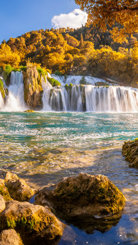 The autumn scenery of the waterfall