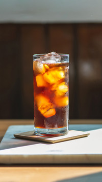 Iced black coffee on the wooden table