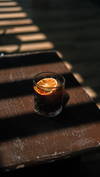 Cold brew coffee with a slice of orange