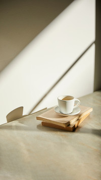 A room with various objects such as warm sunlight