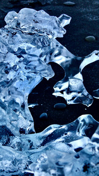 Black sand beach crystal glacier ice