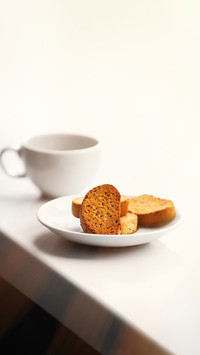 Breakfast of crackers and coffee on the windowsill