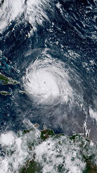 Two major storms upgraded to hurricanes this week