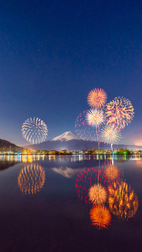Firework around Fuji mountain in Kawagushiko lake Japan