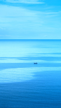 Fisherman ships in the blue sea