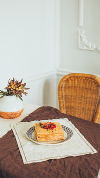 Homemade healthy organic honey cake with berry jam inside