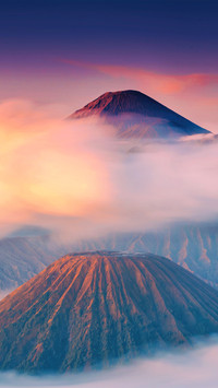 Volcanic landscape between clouds
