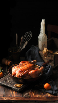 Fresh homemade baked chicken with tangerines