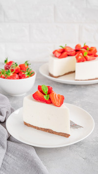 Strawberry-mint cake on a white plate