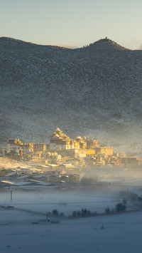 Snow-colored morning light reflects on Songzan