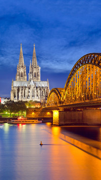 Cologne Cathedral and Hohenzollern bridge over Rhine River