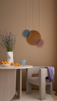 Interior design of warm dining room with round table