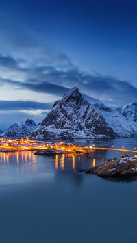 Norway at blue hour seen from the hill in front