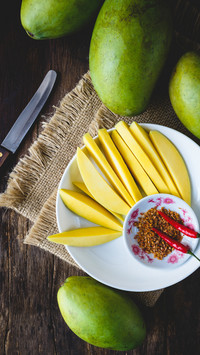 Mango dipped in chili pepper delicious double