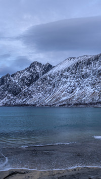 The blues of the sunrise over the snowcapped mountains