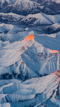 Sunrise over the snowy plain natural scenery